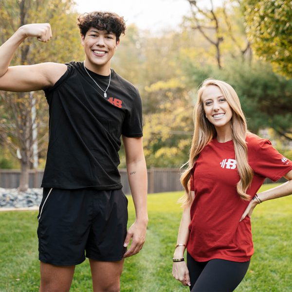 Brittany Lynne Fitness Red T-Shirt with Jackson Mahomes flexing