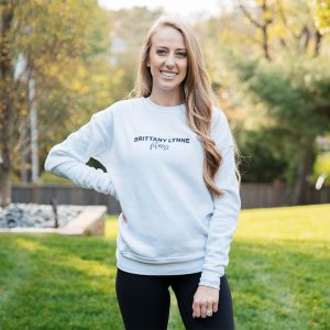 Brittany Lynne Fitness White Crewneck from the front