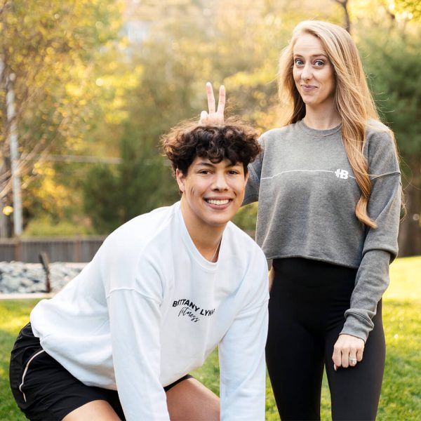 Brittany Lynne Fitness White Crewneck - Brittany giving Jackson Mahomes bunny ears